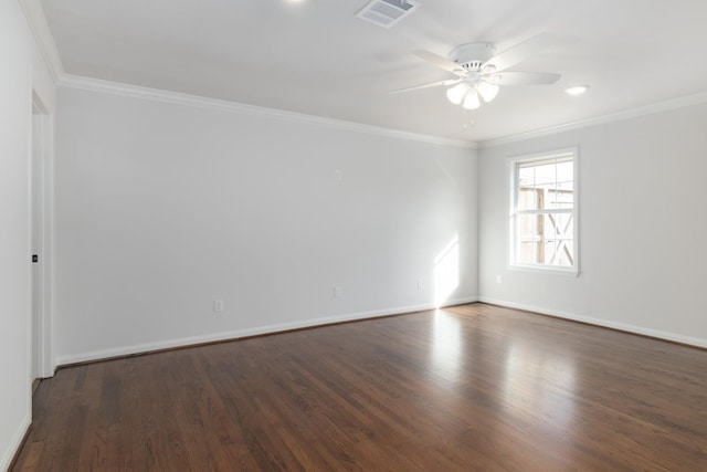 empty room with ceiling fan, ornamental molding, and dark hardwood / wood-style floors