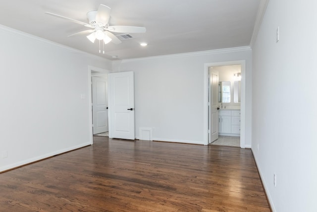 spare room with ceiling fan, ornamental molding, and dark hardwood / wood-style floors