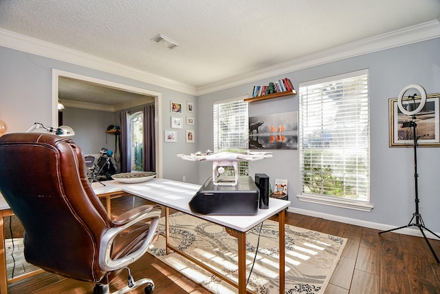 interior space featuring dark hardwood / wood-style flooring, crown molding, and a textured ceiling