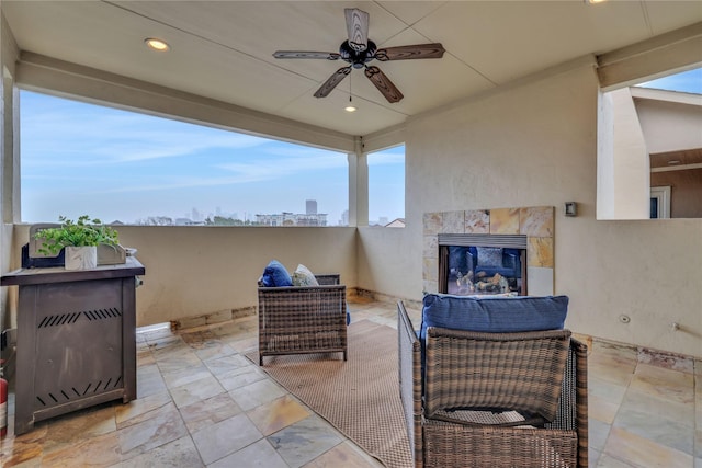 view of patio / terrace featuring ceiling fan