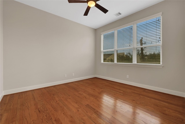 spare room featuring ceiling fan and wood-type flooring