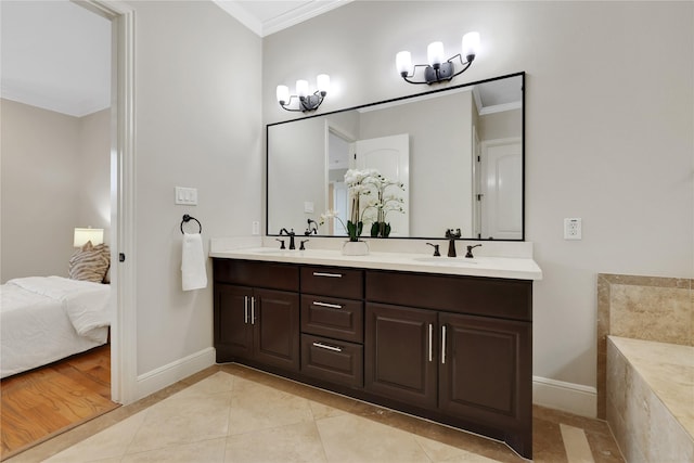 bathroom featuring vanity, tile patterned floors, and ornamental molding