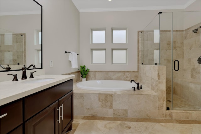 bathroom featuring separate shower and tub, vanity, and ornamental molding