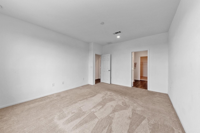 empty room with carpet flooring