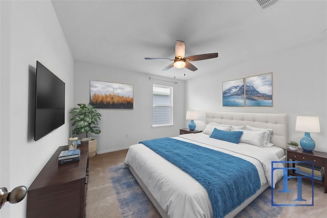 carpeted bedroom with ceiling fan