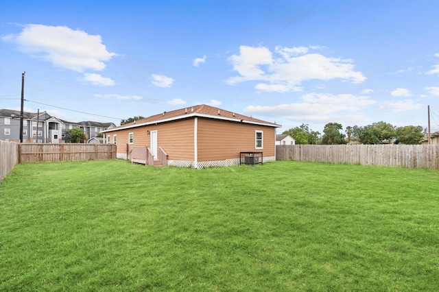 view of yard with central AC unit