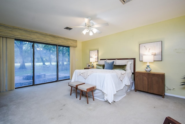 bedroom with ceiling fan, access to exterior, and carpet flooring