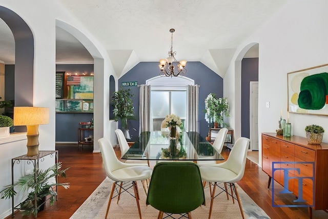 16407 Jadestone Terrace Ln, Houston, TX 77044 - dining area with wood finished floors, a chandelier, and vaulted ceiling