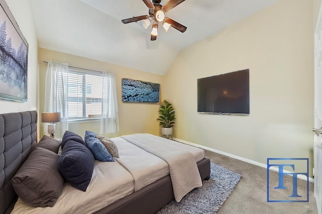 carpeted bedroom featuring ceiling fan and lofted ceiling