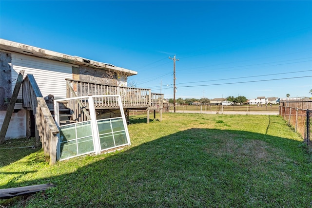 view of yard featuring a wooden deck