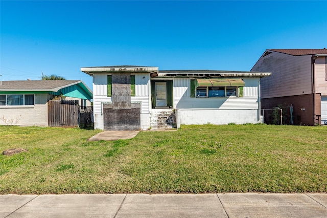 view of front of home with a front yard