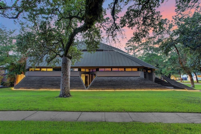 exterior space with a yard