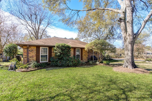 ranch-style home with a front yard