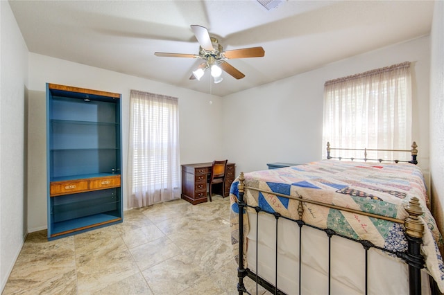 bedroom featuring ceiling fan