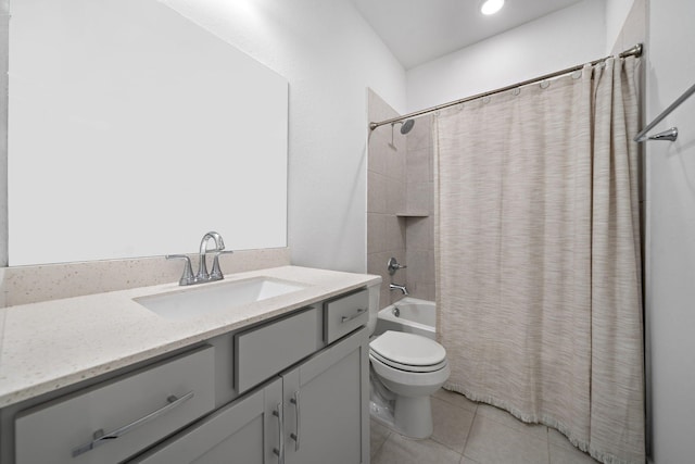 full bathroom with vanity, shower / tub combo, tile patterned flooring, and toilet