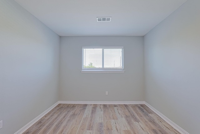 unfurnished room featuring light hardwood / wood-style flooring