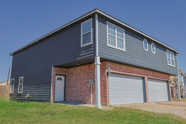 exterior space with a garage