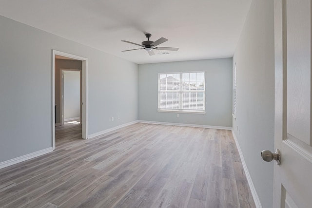 unfurnished room with ceiling fan and light hardwood / wood-style flooring