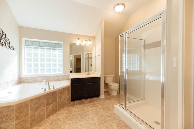 full bathroom with toilet, vanity, vaulted ceiling, and plus walk in shower