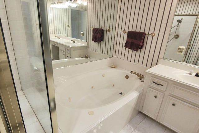 bathroom with vanity, tile patterned floors, and plus walk in shower