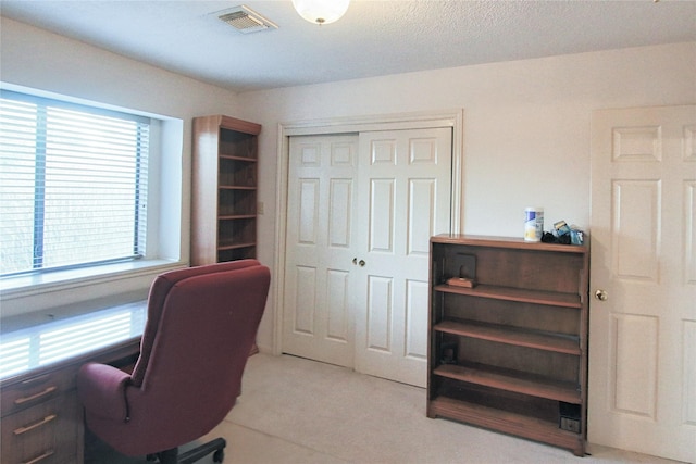 office area with light tile patterned floors