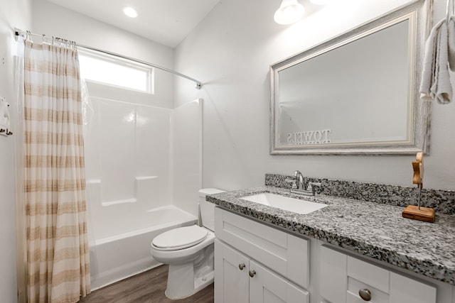 full bathroom featuring shower / tub combo with curtain, vanity, wood-type flooring, and toilet