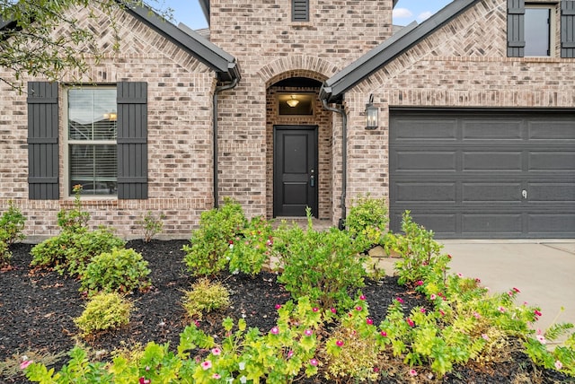 entrance to property featuring a garage