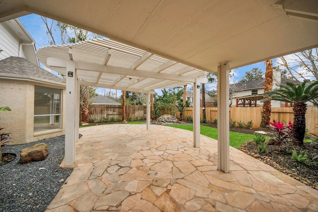 view of patio featuring a pergola