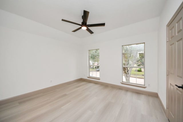 unfurnished room featuring ceiling fan and light hardwood / wood-style floors