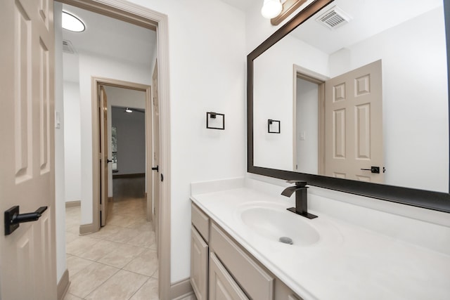 bathroom featuring vanity and tile patterned flooring