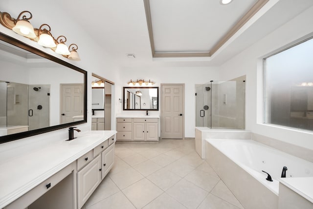 bathroom with vanity, tile patterned flooring, a tray ceiling, ornamental molding, and shower with separate bathtub