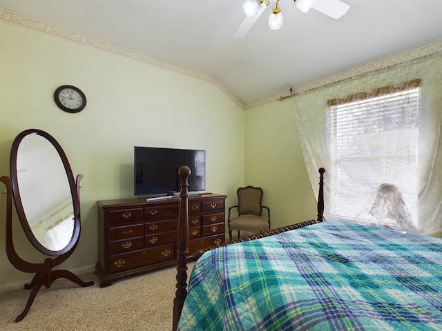 bedroom featuring ceiling fan, light colored carpet, and lofted ceiling