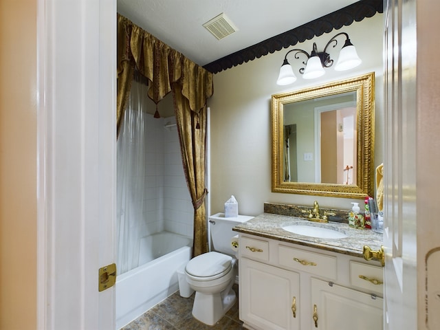 full bathroom featuring toilet, vanity, and shower / bath combo