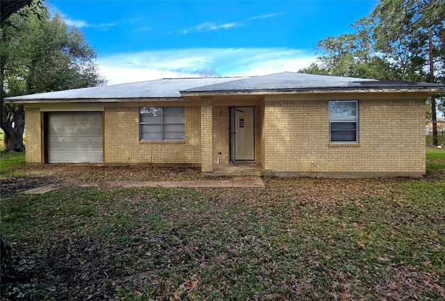 single story home with a garage