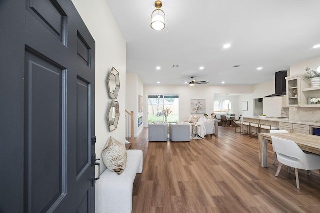 entrance foyer with hardwood / wood-style flooring and ceiling fan