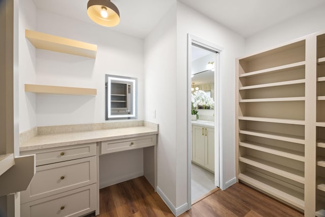 bathroom with hardwood / wood-style flooring