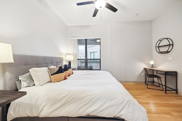 bedroom featuring wood-type flooring, ceiling fan, and access to outside