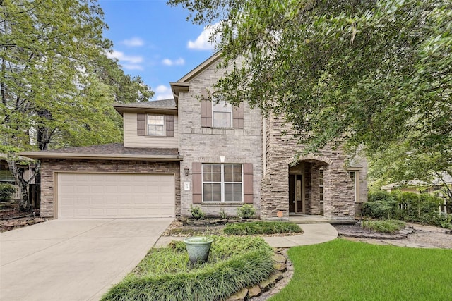 view of front of property with a garage