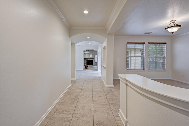 corridor featuring ornamental molding