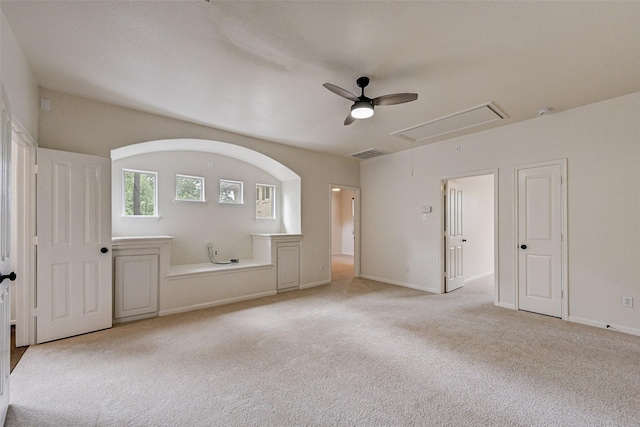 empty room with ceiling fan and light colored carpet