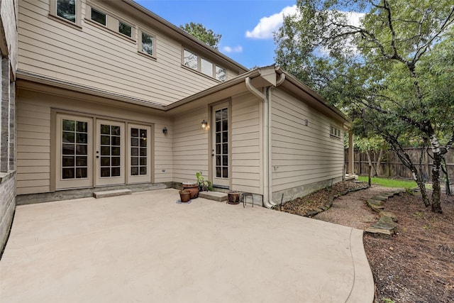 back of house featuring a patio