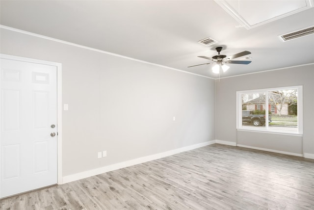 unfurnished room featuring ceiling fan, ornamental molding, and light hardwood / wood-style flooring