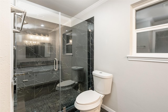 bathroom featuring toilet, crown molding, and an enclosed shower