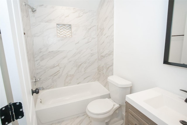 full bathroom with vanity, toilet, and tiled shower / bath combo