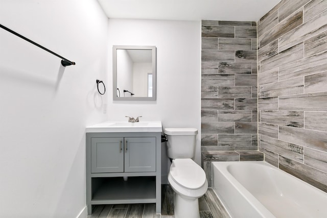 full bathroom featuring vanity, toilet, and shower / washtub combination