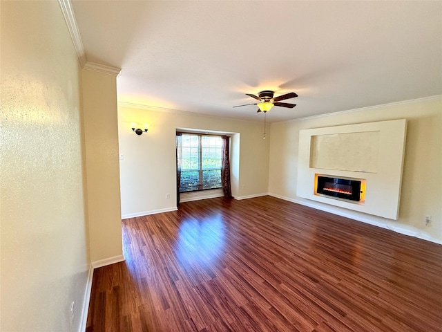 unfurnished living room with dark wood-type flooring, ceiling fan, and ornamental molding