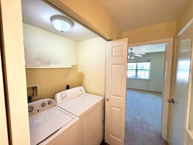 clothes washing area with washer and dryer and carpet flooring