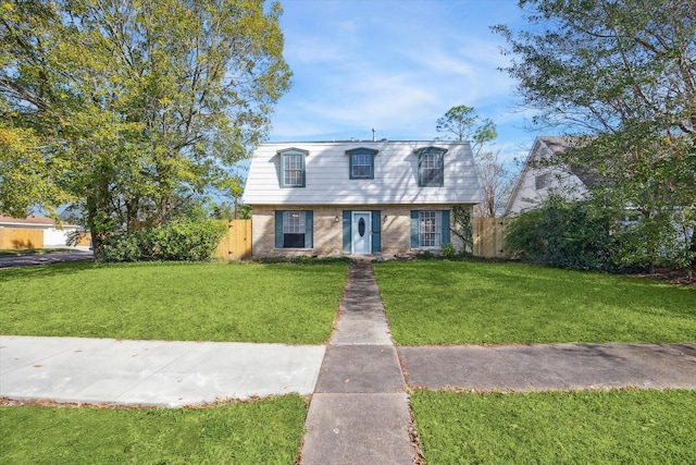 view of front facade with a front lawn