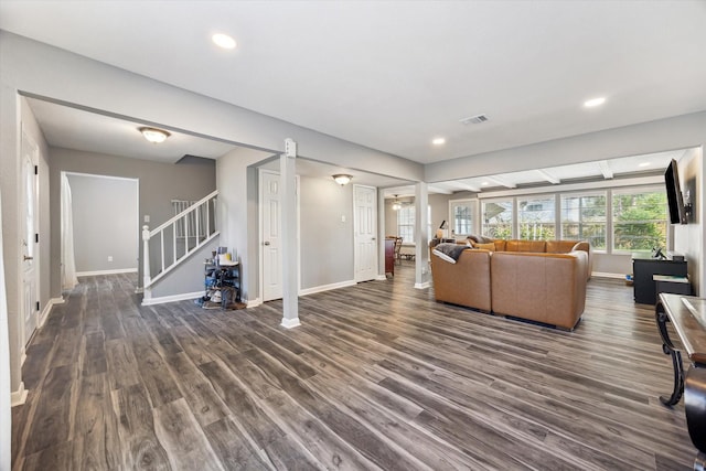 unfurnished living room with dark hardwood / wood-style floors