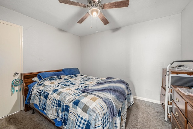 bedroom with ceiling fan and carpet floors